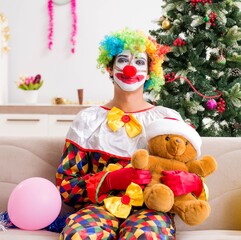 Funny clown in Christmas celebration concept