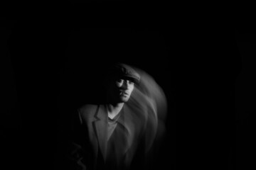 Portrait blurred in the dark.Portrait in motion.