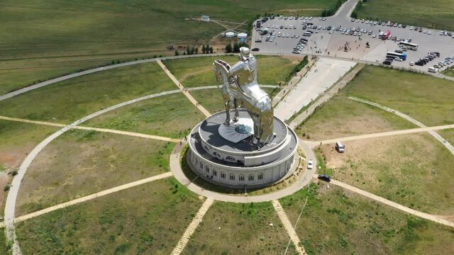 Aerial around view of huge equestrian statue of Genghis Khan in the steppe, Mongolia, Ulaanbaatar, 4k