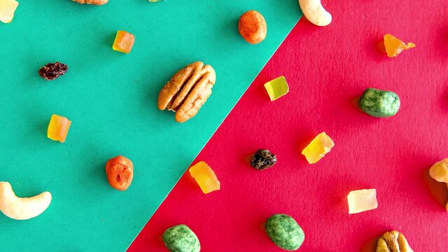 Slide show of Walnuts, peanuts and cashews on a Christmas table top view