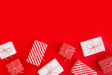 Christmas gift boxes on a red background.
