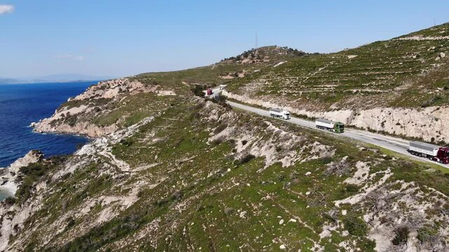 trucks going on the mountain road, truck logistics