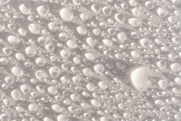 Lots of drops on a white background.