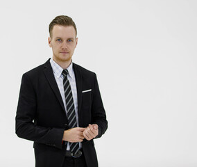 Determined businessman in suit in studio