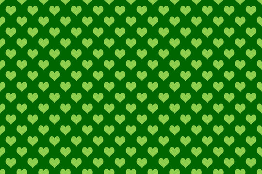 Seamless green heart pattern on green background for valentine wrap design and cute heart pattern background image.