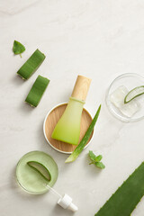 Aloe vera extract research in laboratory with a petri dish dropper and cosmetic jar template in white background for aloe vera research advertising , photography science content