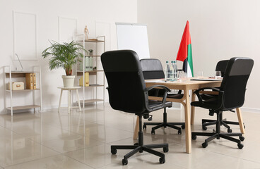 Modern office with UAE flag prepared for business meeting