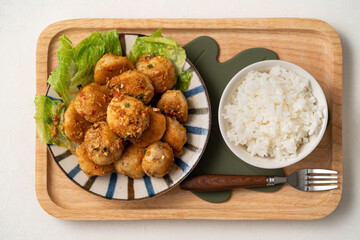 Deep fried cuttlefish ball with salted egg yolk coating