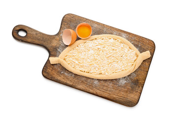 Homemade Ajarian khachapuri preparing for baking on white background