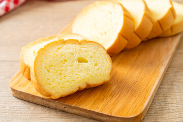 potatoes bread sliced on wood board