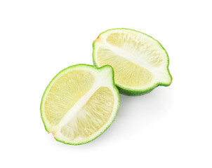 Halves of fresh cut lime on white background