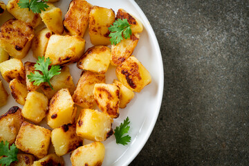 Roasted or grilled potatoes  on plate