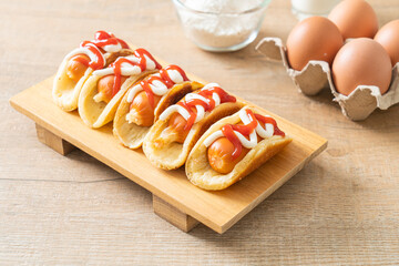 flat pancake roll with sausage