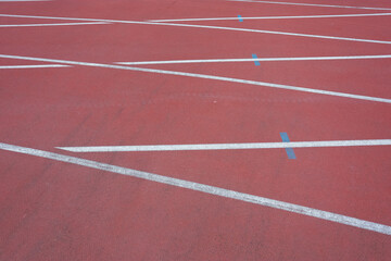 Fototapeta premium Blank running tracks white in stadium for competition or ordering concept. High quality photo