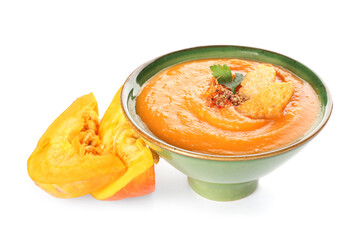 Bowl with delicious pumpkin cream soup on white background