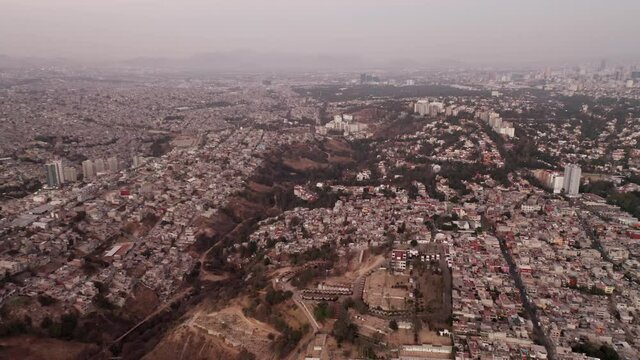 Aerial flying over La Enramada City in Mexico at day