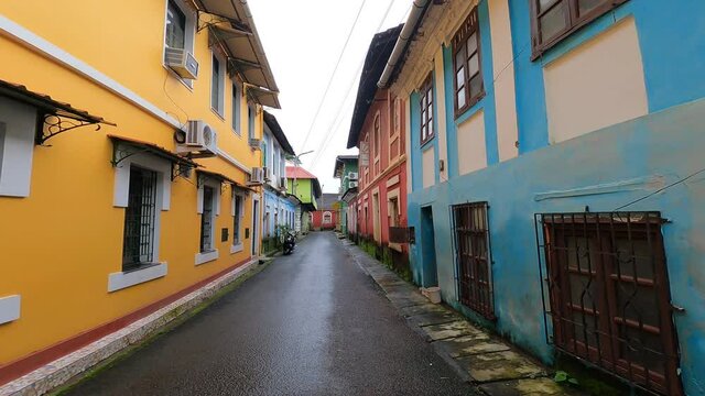 colorful street in Panaji, Goa, India. typical arcitecture on a pretty street. A walk through Fontainhas, A Colourful Portuguese Colony