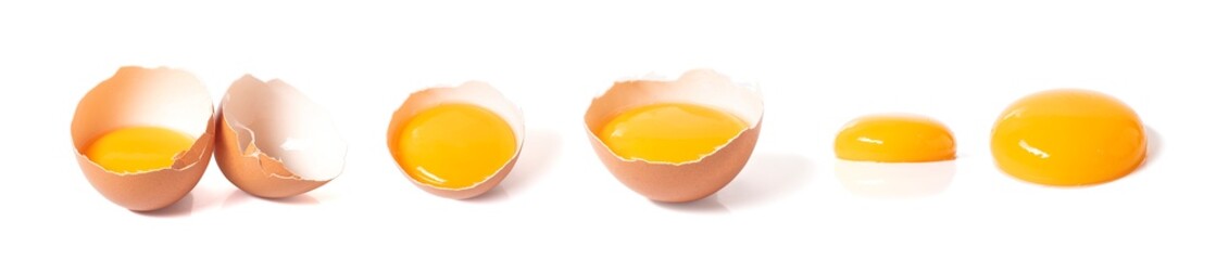 half broken egg and yolk isolated on white background with clipping path.