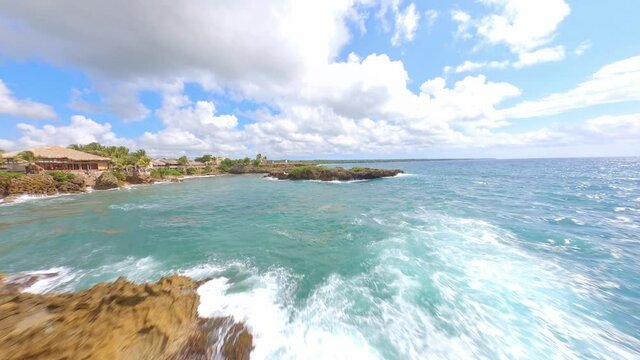 Aerial drone fpv over sea rocks of Boca de Yuma in Dominican Republic