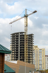 Construction crane next a building site