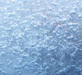 Blue crystals of snow and ice as an abstract background.