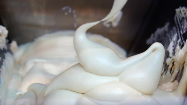 Close-up of making sweets in production.
