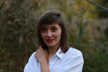 Woman in white shirt in the park