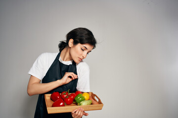 woman in black aprons vegetables healthy food lifestyle