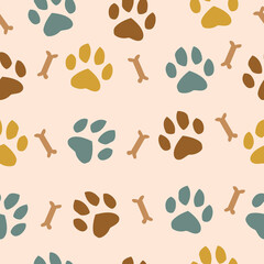 Fototapeta na wymiar Cool pet background with dog paw prints and bones. Vector seamless texture.