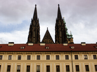 Yellow building in front of St. Vitus Cathedral