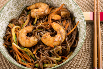 Bowl of Yakisoba with shrimps, viewed from above