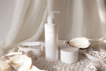 Mockup bottle with cosmetic jar on beige background