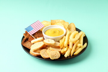Concept of Super bowl snacks on mint background
