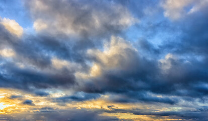 Sunset with a cloudy landscape