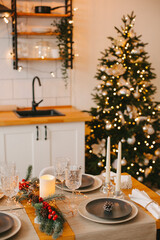 Merry Christmas and Happy Holidays. Time of family tea party. Cups of warm tea with Christmas cookies on wooden table.