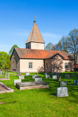 Fototapeta na wymiar Cemetery with graves at a church in Sweden