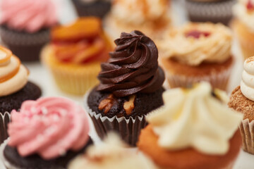 Cupcake with walnut and chocolate cream as decoration