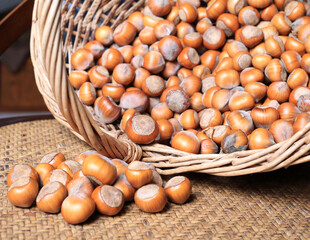 Hazelnuts in a wicker basket close-up