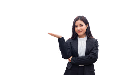 Beautiful Thai Asian woman in a suit is folding her arms, spreading her hands and looking at the camera, against a white background.