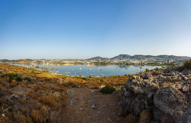 Fototapeta na wymiar Landscape photo with a view of the bay of the city of Gumbet near Bodrum, Turkey.