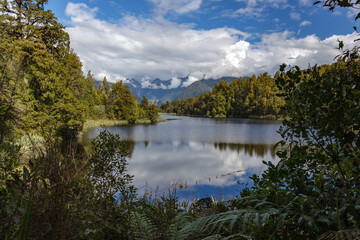 Fototapeta na wymiar Scenic view of Lake Matheson in New Zealand in summertime