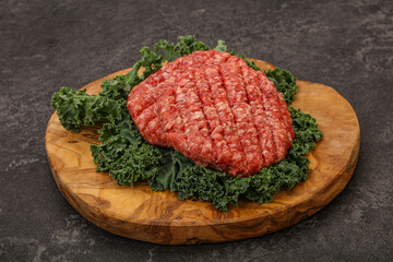 Raw beef burger cutlet for cooking