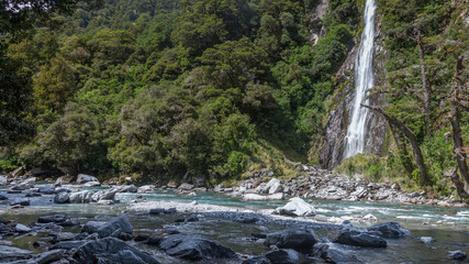 Scenic view of Thunder Creek Falls in New Zealand