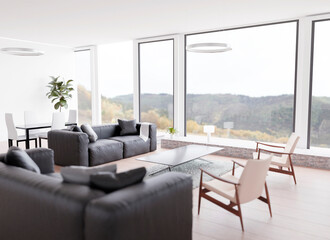 Fototapeta na wymiar Modern living room with with with large panoramic windows and wooden armchairs 