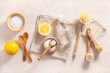 zero waste eco friendly cleaning concept. wooden brushes, lemon, baking soda, vinegar