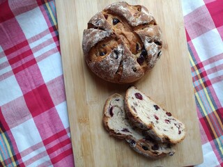 Crusty Bread mixed with dried cranberries. Bake the bread to be crispy on the outside, soft inside.