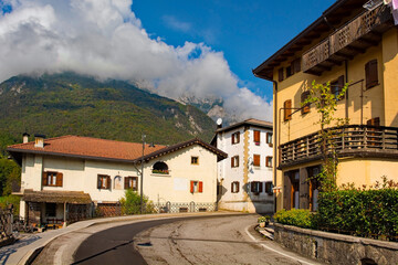 The main road which runs through the small town of Ampezzo in Udine Province, Friuli-Venezia Giulia, north east Italy

