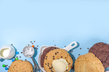 White and chocolate giant cookies. Very big cookies – chocolate, vanilla, chocolate chips, with ice cream ball. Trendy sweet baking.