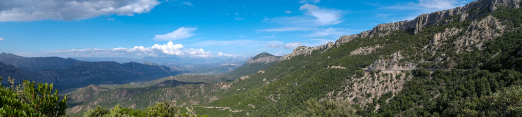 Fototapeta na wymiar City of Dorgali in Sardinia Italy. Top view of a beautiful city between the mountains. 