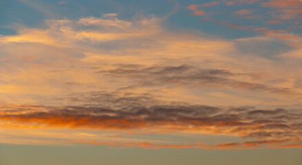 Colorful sunset background with dark and light parts in sky